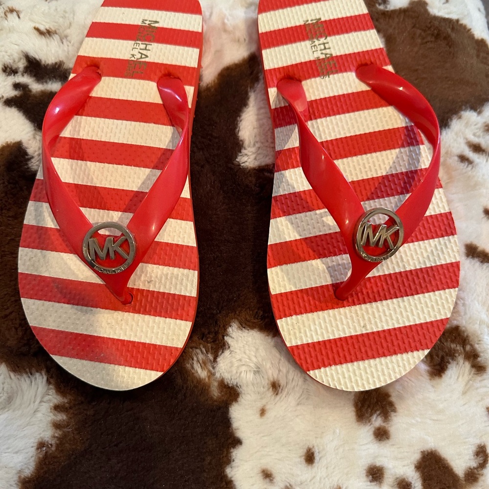 Michael Kors Coral and White Striped Flip Flops with MK Medallion